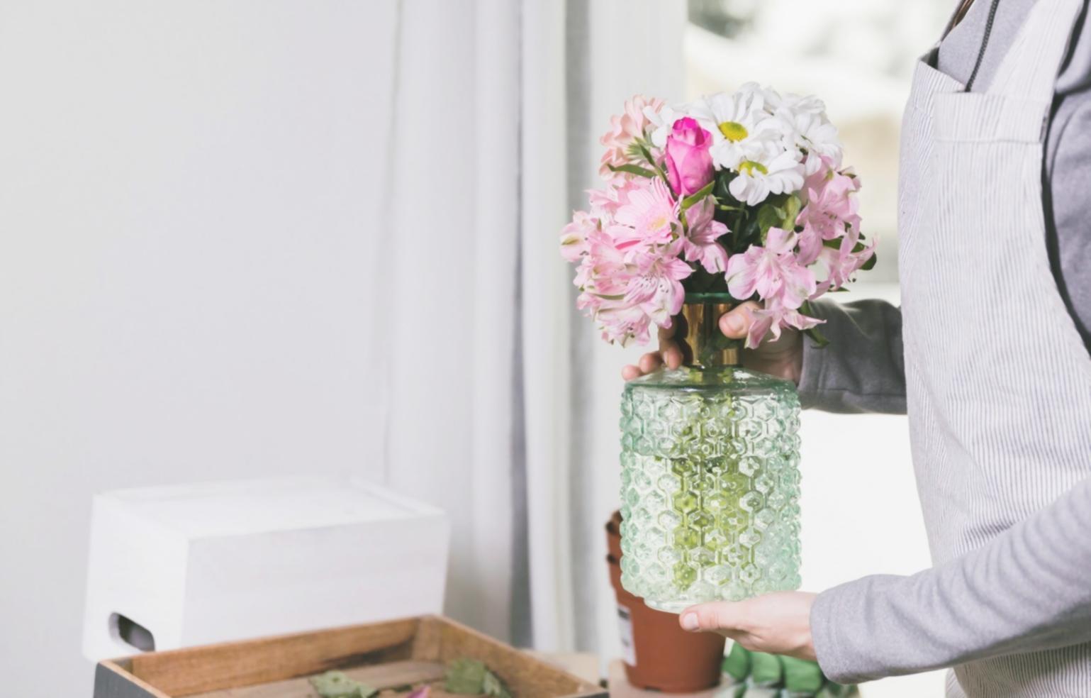 Minimalist bouquet emphasizing negative space and single focal point